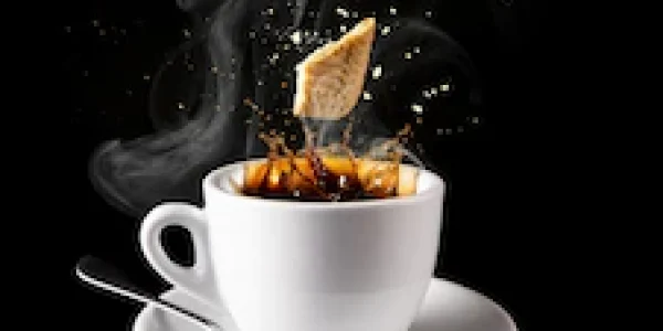 vertical-shot-hot-coffee-with-waffles_181624-43126